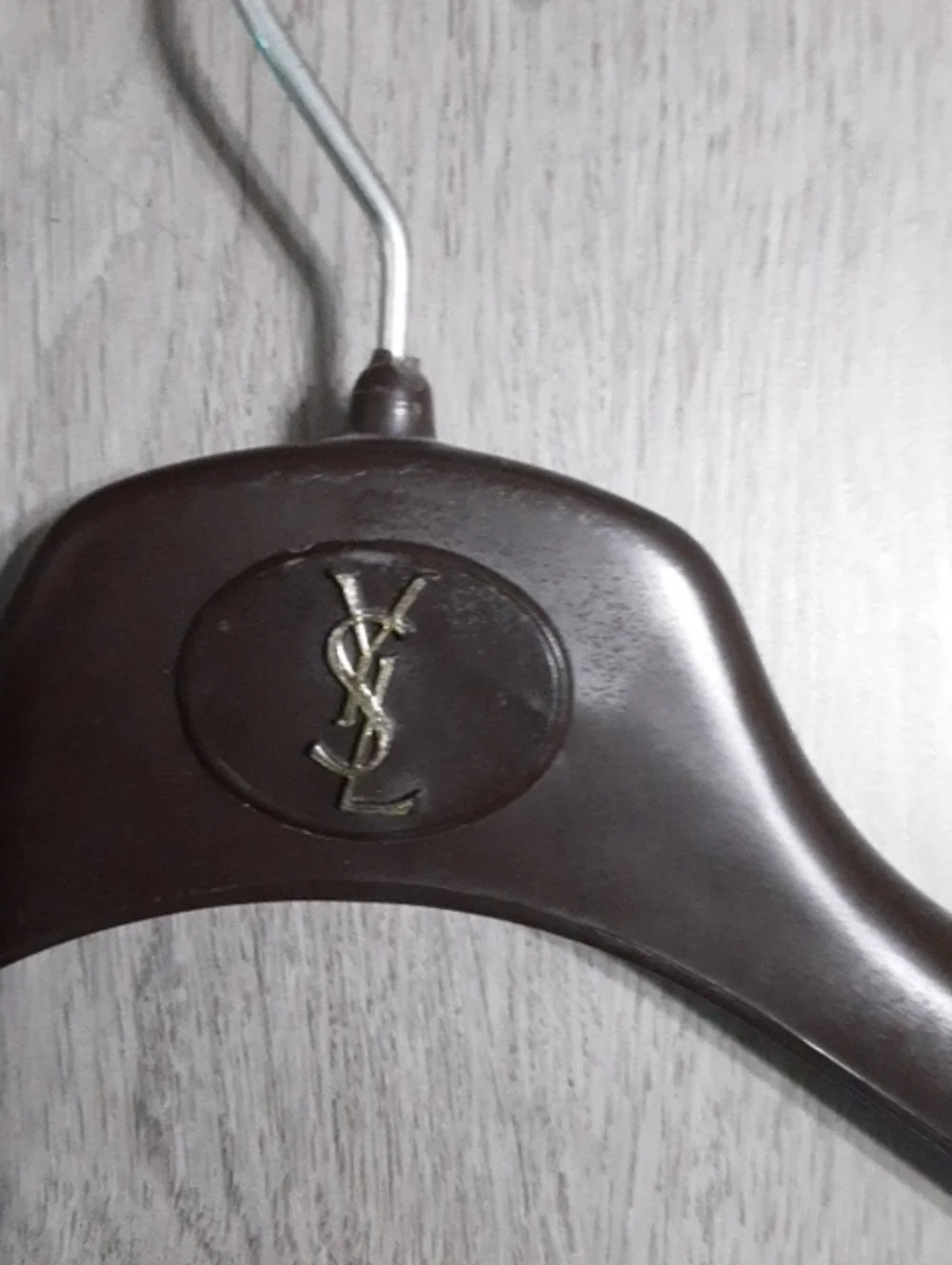 Yves Saint Laurent Brown Plastic Hanger with Gold Logo